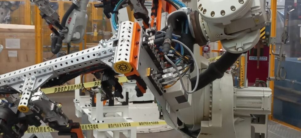 AUTOMATED MANUFACTURING CELL WITH ABB IRB 6700 – IRC5 ROBOTS